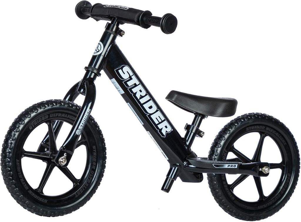 Strider 12' Pro Bike, No Pedal Balance Bicycle for Kids 1 to 4 Years - Includes Safety Pad, Padded Seat, Mini Grips & Flat-Free Tires - Tool Free