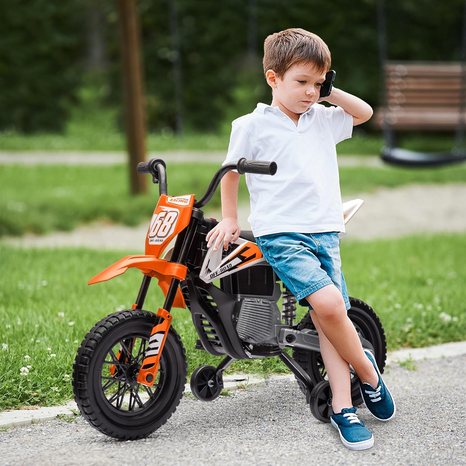Qaba Kids Dirt Bike with Twist Grip Throttle, 12V Electric Motorcycle, Electric Bike for Toddler with Training Wheels, Spring Suspension & Music, Orange