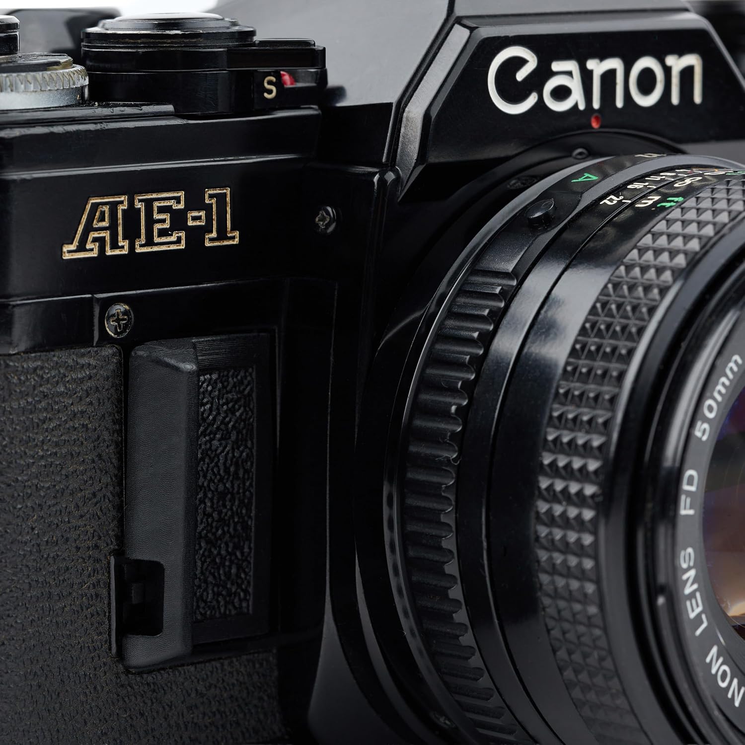 Canon AE-1 35mm SLR Film Manual Focus Camera (Black) with 50MM Canon FD Mount Lens. (Renewed)