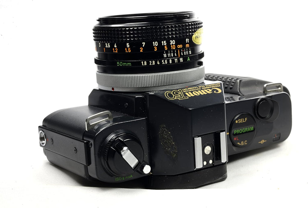 Canon T50 35mm SLR Film Camera Camera Kit with Canon FD Mount Zoom Lens. (Renewed)
