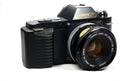 Canon T50 35mm SLR Film Camera Camera Kit with Canon FD Mount Zoom Lens. (Renewed)