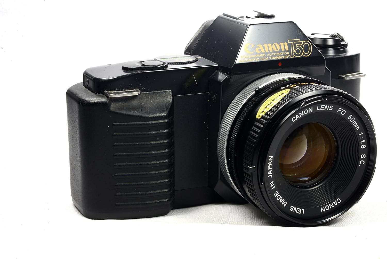 Canon T50 35mm SLR Film Camera Camera Kit with Canon FD Mount Zoom Lens. (Renewed)