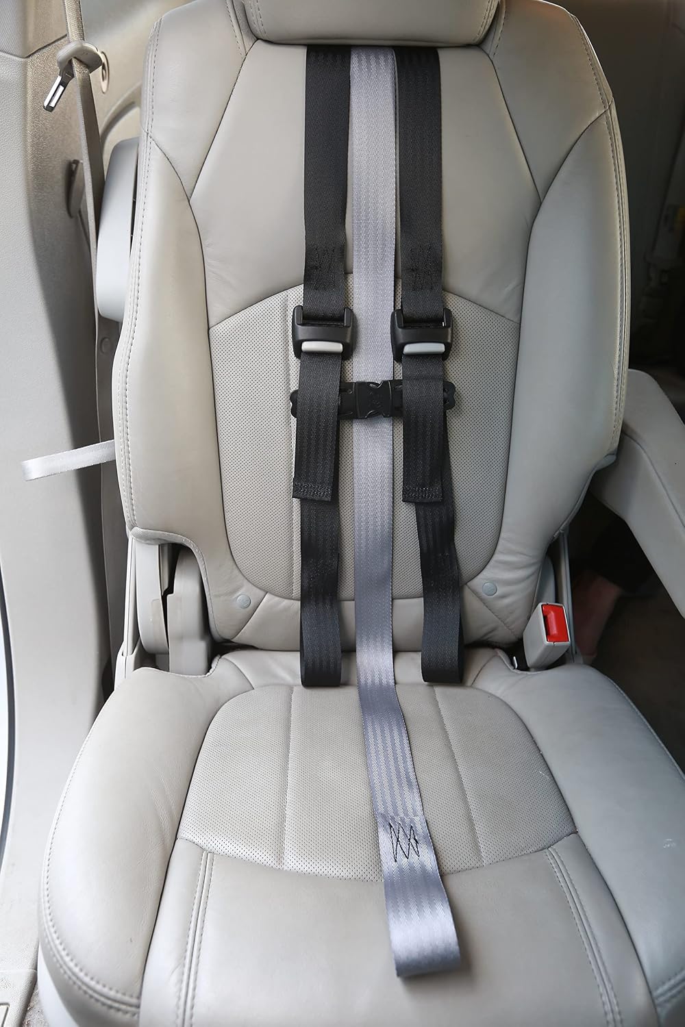 EZ-ON Products Durable 43YC. One Size Fits Most. Converts Personal Vehicle Lap or Lap/Shoulder Seatbelts Into a 5-Point Securement. User-Friendly Vest. No Mount Needed. Meets NHTSA Regulation.
