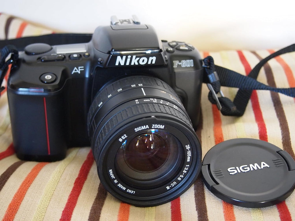 Nikon N6006 / F-601 35MM SLR Film Camera with Nikon AF Lens Kit. Built-in Flash and motor drive. (Renewed)