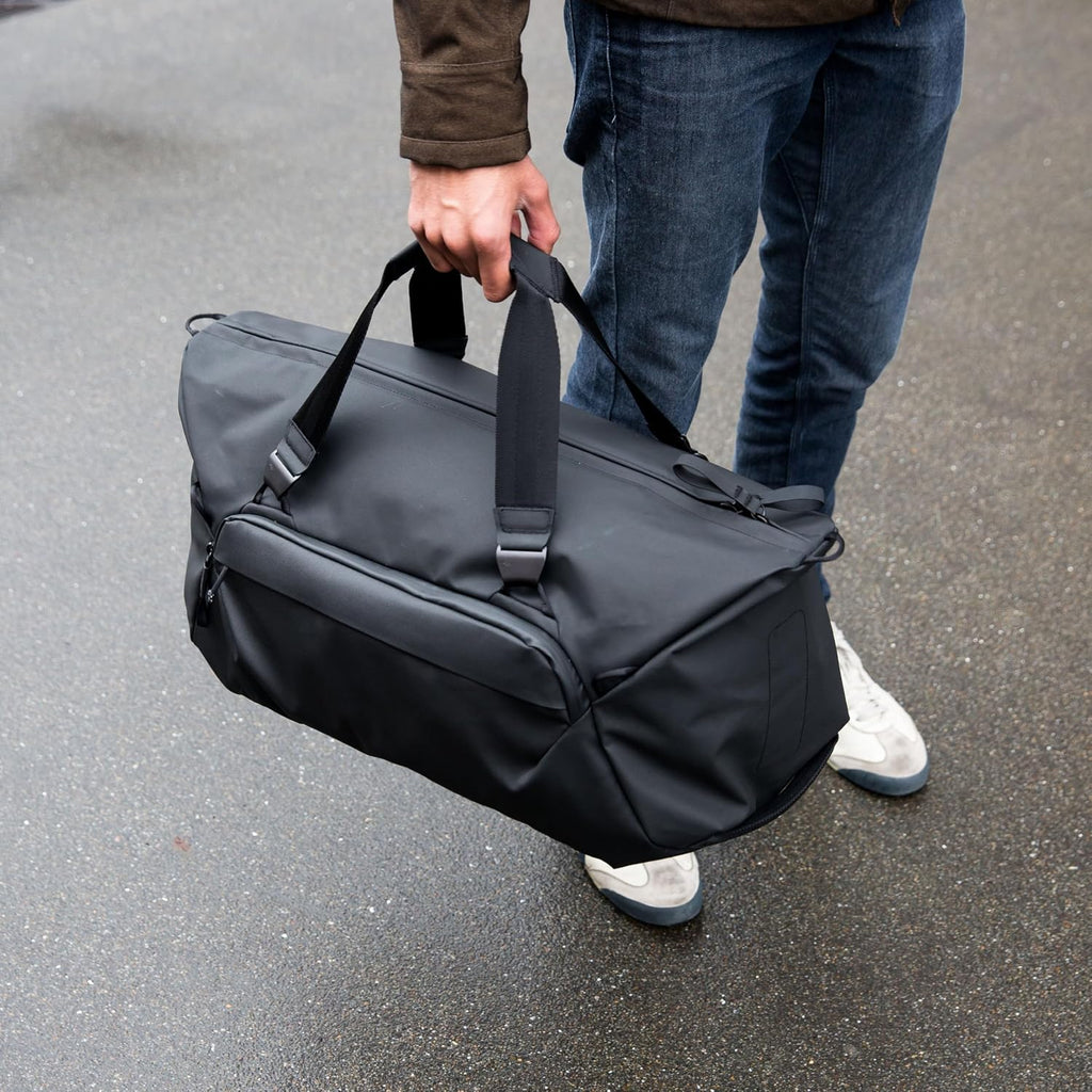 Peak Design Travel Duffel, Extra-Wide Single Zip Access, Weatherproof Shell, 4 External Pockets, Fits Packing Cubes & Camera Cubes, Ideal for Weekend Trips, Versatile Duffel Bag for Travel