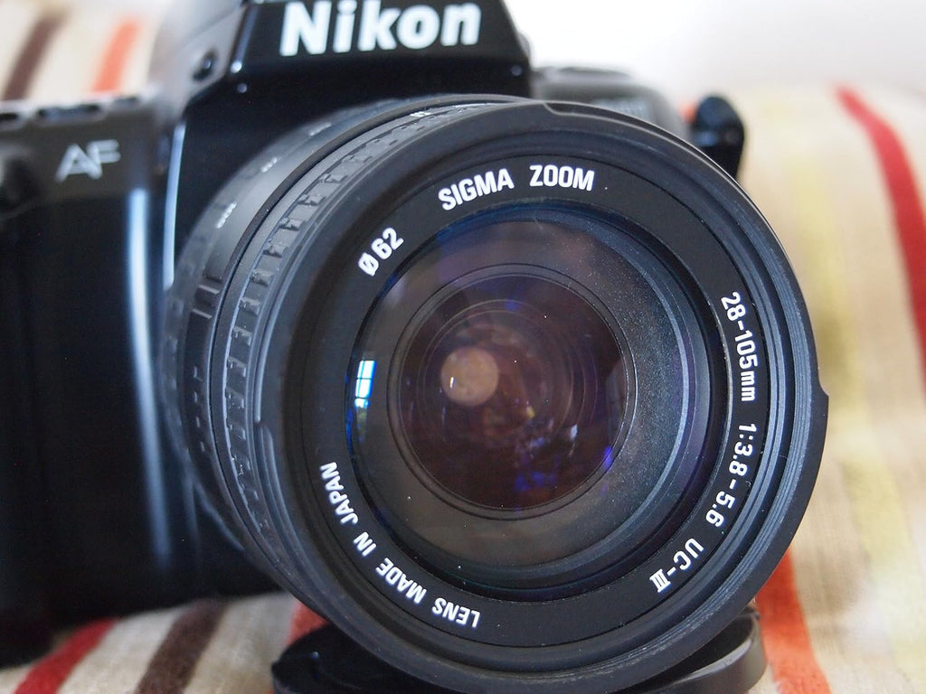 Nikon N6006 / F-601 35MM SLR Film Camera with Nikon AF Lens Kit. Built-in Flash and motor drive. (Renewed)